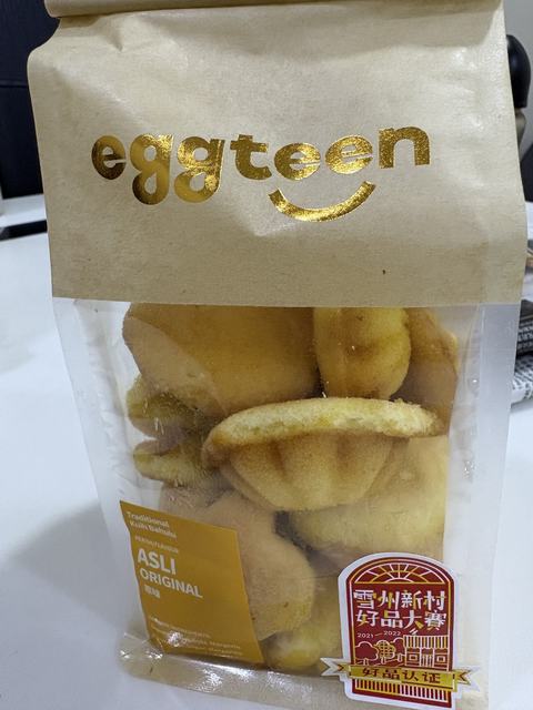 Egg cakes in an Eggteen paper bag labelled “Asli Original”
